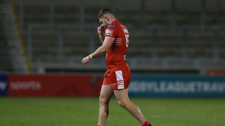 Ryan Lannon of Salford Red Devils looks dejected as he is sent off