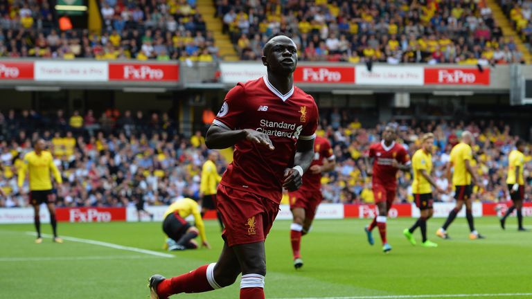 WATFORD, ENGLAND - AUGUST 12:  Sadio Mane of Liverpool celebrates scoring his sides first goal during the Premier League match between Watford and Liverpoo