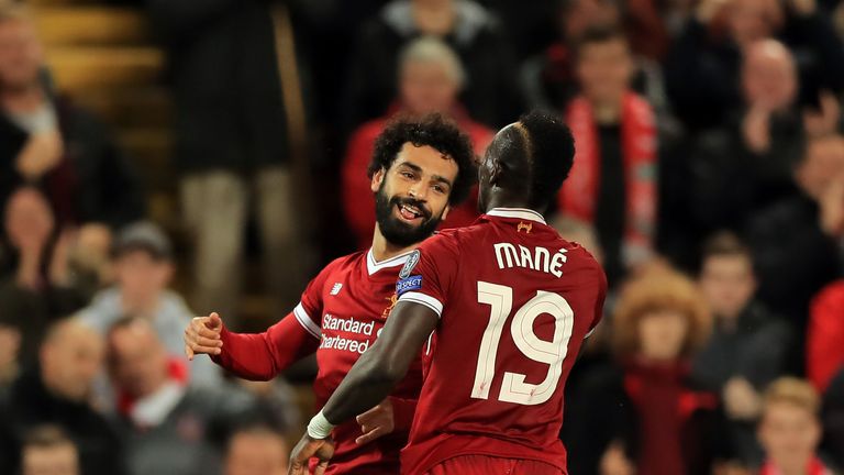 Liverpool's Mohamed Salah celebrates scoring his side's second goal of the game with Sadio Mane during the UEFA Champions League, Group E match at Anfield,