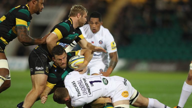 SEPTEMBER 15 2017:  Rob Horne of Northampton is tackled by Sam Underhill during the Aviva Premiership match between Northampton and Bath