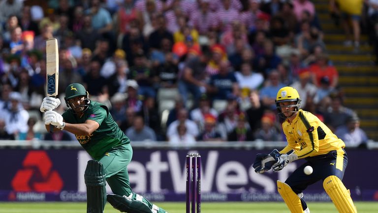 BIRMINGHAM, ENGLAND - SEPTEMBER 02:  Samit Patel of Notts Outlaws hits out ahead of Calvin Dickinson of Hampshire during the NatWest T20 Blast Semi-Final m
