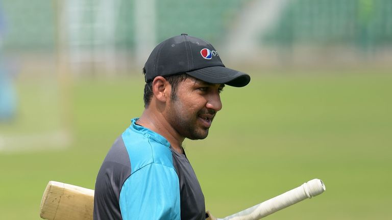 Pakistani cricket captain Sarfraz Ahmad arrives for bat during a practice session at the Gaddafi Cricket Stadium in Lahore on September 8, 2017, for the fo