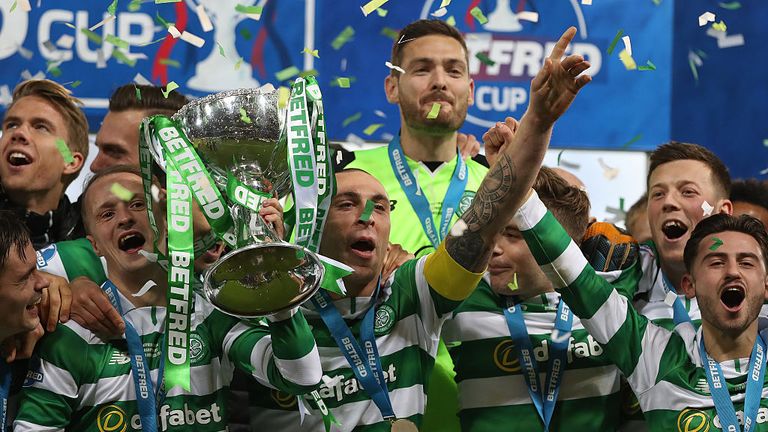 Scott Brown of Celtic lifts the trophy after the 2016 Betfred Cup Final between Aberdeen and Celtic at Hampden Park on November 26