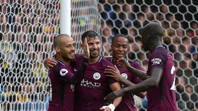 Manchester City's Sergio Aguero (left centre) celebrates with David Silva (left), Raheem Sterling (right centre) and Benjamin Mendy at Watford