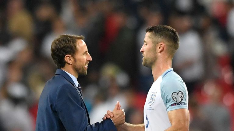 LONDON, ENGLAND - SEPTEMBER 04:  Gareth Southgate manager of England and Gary Cahill of England shake hands after the FIFA 2018 World Cup Qualifier between