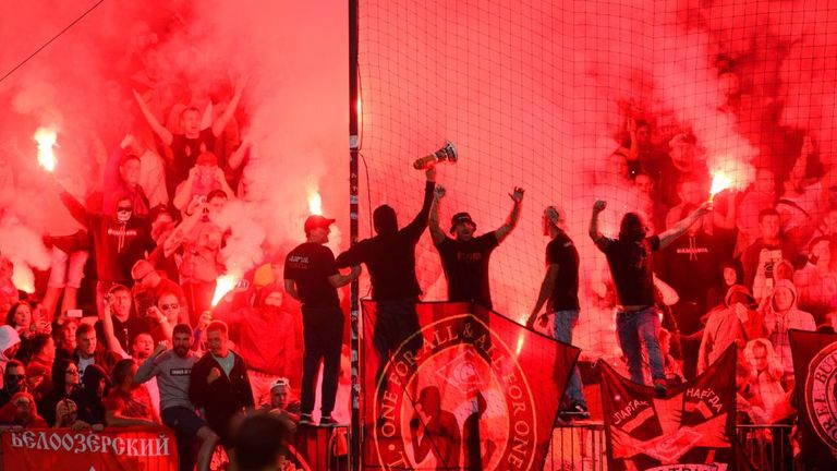 Spartak Moscow fans burn flares during the Champions League match at NK Maribor