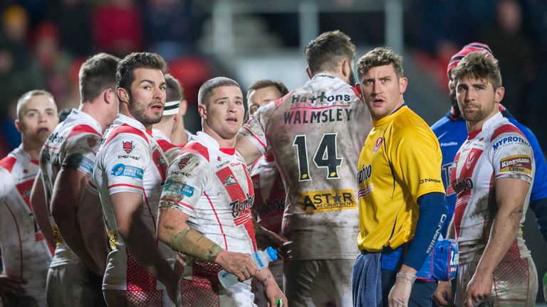  St Helens, England - St Helens watch as another try is given by the video referee.