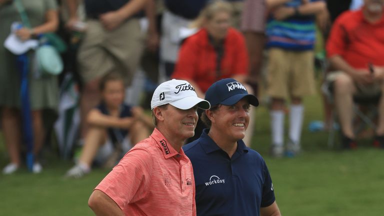 CHARLOTTE, NC - AUGUST 08:  Phil Mickelson and Steve Stricker of the United States prepare to putt during a practice round prior to the 2017 PGA Championsh
