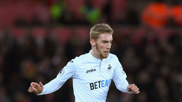 SWANSEA, WALES - JANUARY 14:  Swansea player Oli McBurnie in action during the Premier League match between Swansea City and Arsenal at Liberty Stadium on 