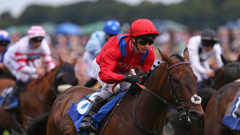 YORK, ENGLAND - JULY 15:  Take Cover ridden by David Allan wins the The John Smith's City Walls Stakes at York Racecourse on July 15, 2017 in York, England