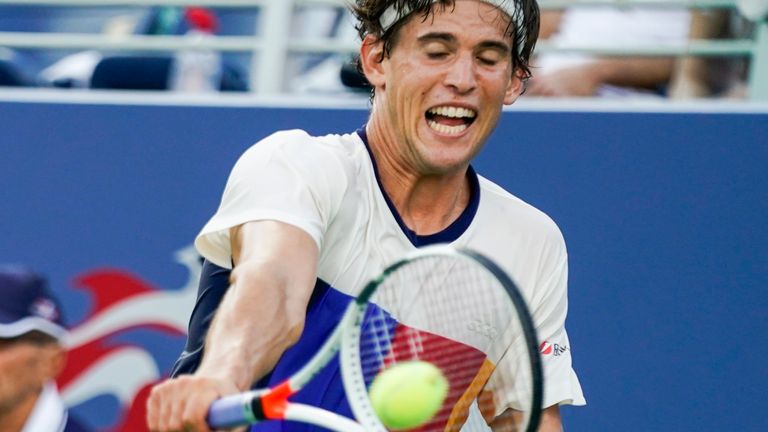 Austria's Dominic Thiem returns the ball to Juan Martin del Potro of Argentina during their Qualifying Men's Singles match at the 2017 US Open