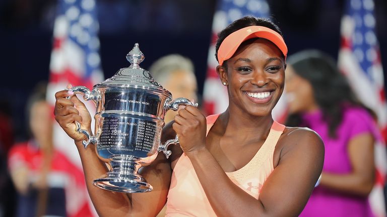 Sloane Stephens of the United States poses with the championship trophy during the trophy presentation after the Women's Singles US Open