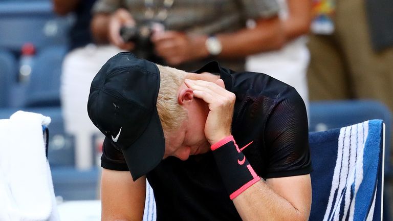 Kyle Edmund of Great Britain takes a medical timeout during his third round match against Denis Shapovalov of Canada at US Open