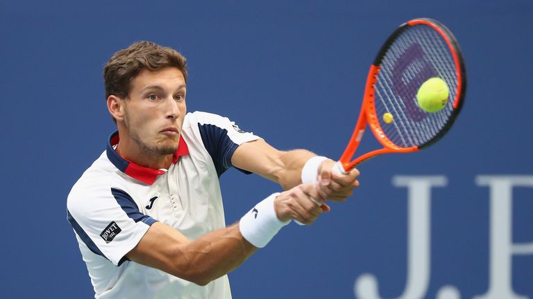Pablo Carreno Busta of Spain returns a shot against Kevin Anderson of South Africa during their Men's Singles Semi-final match at US Open