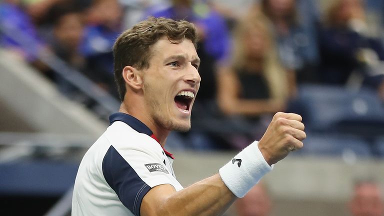 Pablo Carreno Busta of Spain celebrates after winning the second set during his fourth round match against Denis Shapovalov at the US Open