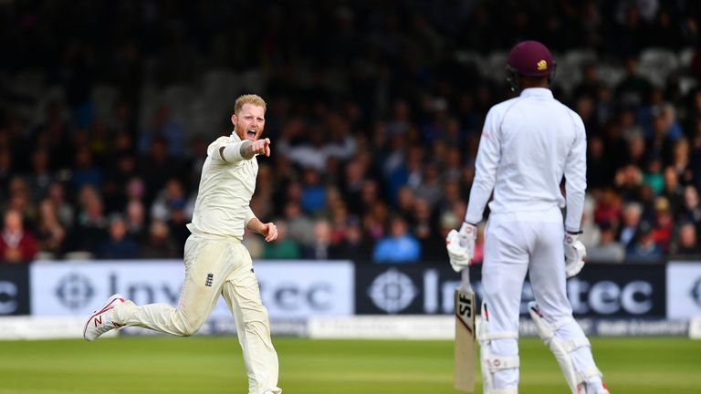 Ben Stokes races away in celebration as he picks up the wicket of Roston Chase, the first of two in an over.