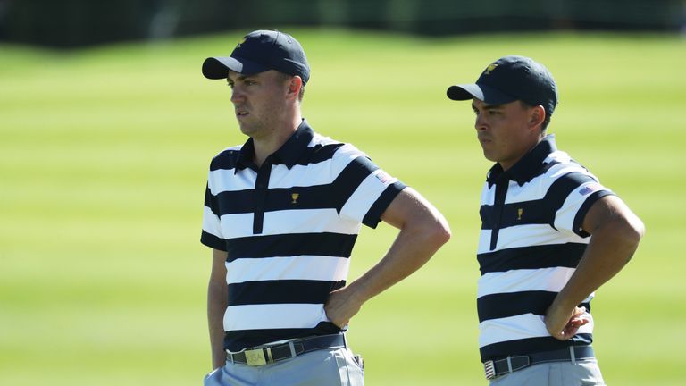 JERSEY CITY, NJ - SEPTEMBER 28:  Rickie Fowler and Justin Thomas of the U.S. Team talk on the eighth green as they play against Hideki Matsuyama of Japan a