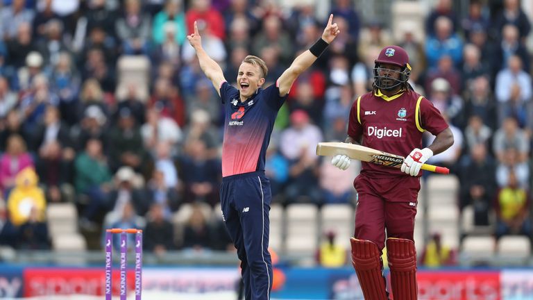 Tom Curran of England celebrates taking the wicket of Chris Gayle of West Indies during the 5th Royal London ODI