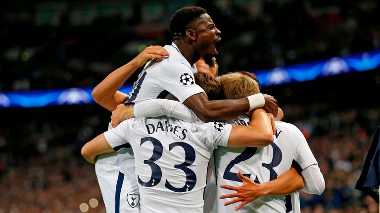 Tottenham players celebrate the opening goal during the UEFA Champions League Group H football match between Tottenham Hotspur and Borussia Dortmund at Wem