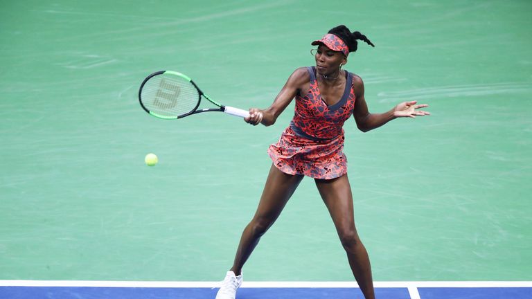 NEW YORK, NY - SEPTEMBER 03:  Venus Williams of the United States returns a shot during her women's singles fourth round match against Carla Suarez Navarro