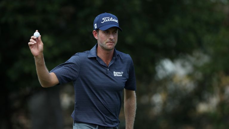 Webb Simpson of the United States reacts to his birdie on the second green during the third round of the Tour Championship 