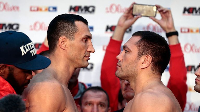 Wladimir Klitschko (L) of Ukraine head to head with Kubrat Pulev (R) of Bulgaria during the official weigh in session.