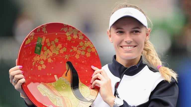 TOKYO, JAPAN - SEPTEMBER 24:  Caroline Wozniacki of Denmark poses with the winners trophy after defeating Anastasia Pavlyuchenkova of Russia in the women's