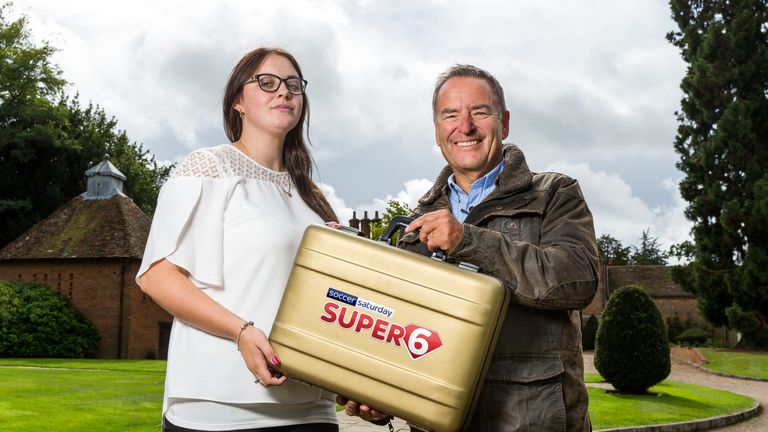 Our first Super 6 millionaire Grace Berry receives her winnings from Soccer Saturday host Jeff Stelling