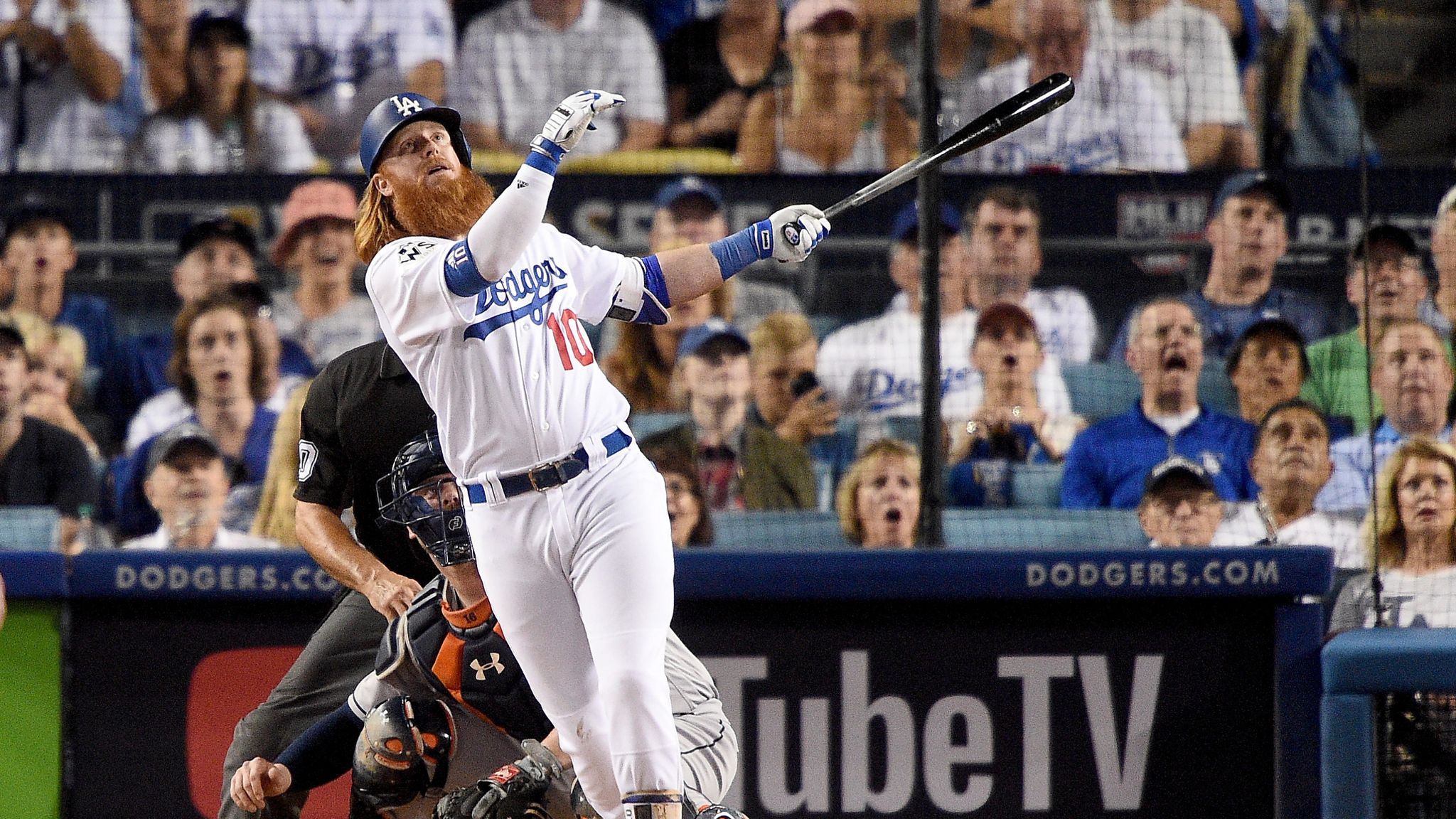 Los Angeles Dodgers' Justin Turner (21) celebrates with manager