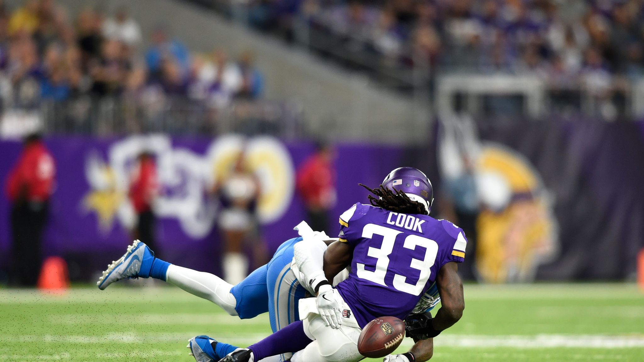 Minnesota Vikings running back Dalvin Cook walks on the field