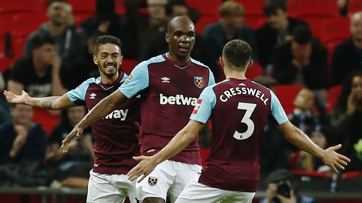 West Ham United's Italian defender Angelo Ogbonna (C) celebrates with teammates scoring the team's third goal during the English Premier League football ma