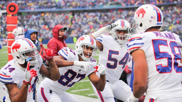 The Bills celebrate after Matt Milano returns a fumble 40 yards for a touchdown