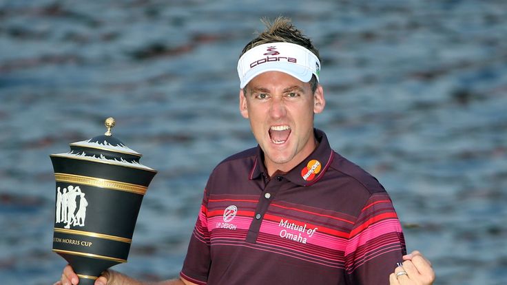 SHENZHEN, CHINA - NOVEMBER 04:  Ian Poulter of England celebrates with the champions trophy after winning the WGC HSBC Champions during the final round at 