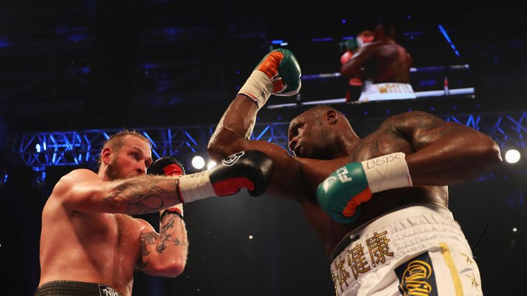 CARDIFF, WALES - OCTOBER 28:  Dillian Whyte (white trunks) and Robert Helenius (black trunks) in action during their WBC Silver Heavyweight Championship co