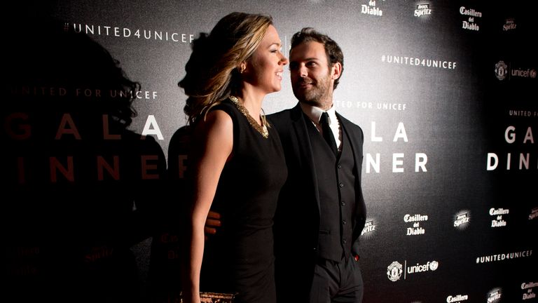 Manchester United midfielder Juan Mata and his girlfriend Evelina Kamph pose for pictures on the red carpet