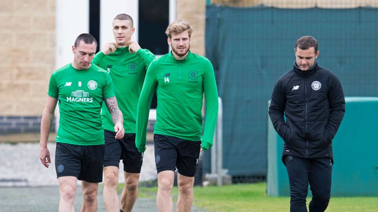 12/10/17. CELTIC TRAINING. LENNOXTOWN. (L-R) Celtic's Scott Brown, Jozo Simunovic, and Stuart Armstrong with coach Shaun Maloney.