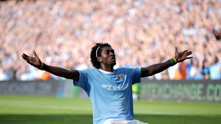 Emmanuel Adebayor celebrates in front of the Arsenal fans