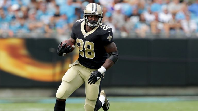 CHARLOTTE, NC - SEPTEMBER 24:  Adrian Peterson #28 of the New Orleans Saints runs with the ball against the Carolina Panthers during their game at Bank of 