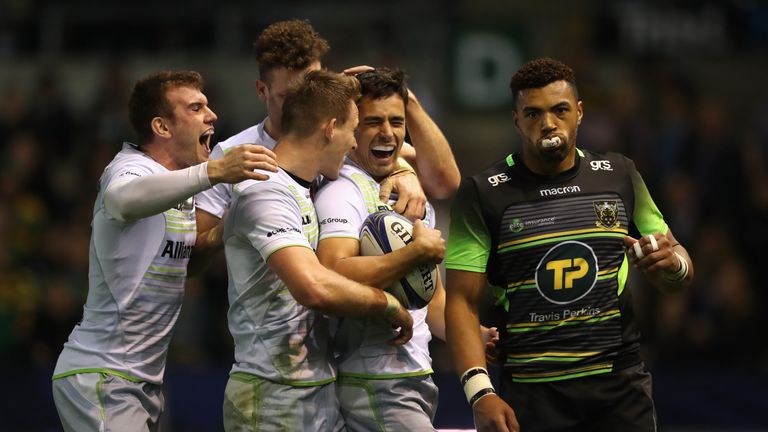 Alex Lozowski is mobbed by team-mates after scoring yet another Saracens try in the Champions Cup match between Northampton and Saracens