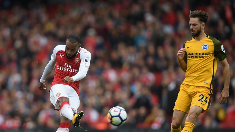 LONDON, ENGLAND - OCTOBER 01:  Alexandre Lacazette of Arsenal shoots during the Premier League match between Arsenal and Brighton and Hove Albion at Emirat