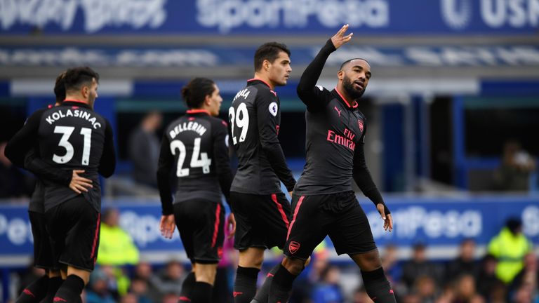 LIVERPOOL, ENGLAND - OCTOBER 22:  Alexandre Lacazette of Arsenal celebrates scoring his sides third goal with his Arsenal team mates during the Premier Lea