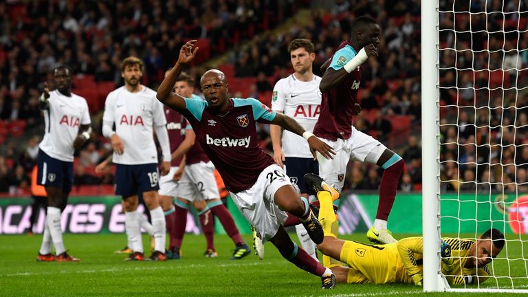 LONDON, ENGLAND - OCTOBER 25:  Andre Ayew of West Ham United scores his side's first goal during the Carabao Cup Fourth Round match between Tottenham Hotsp