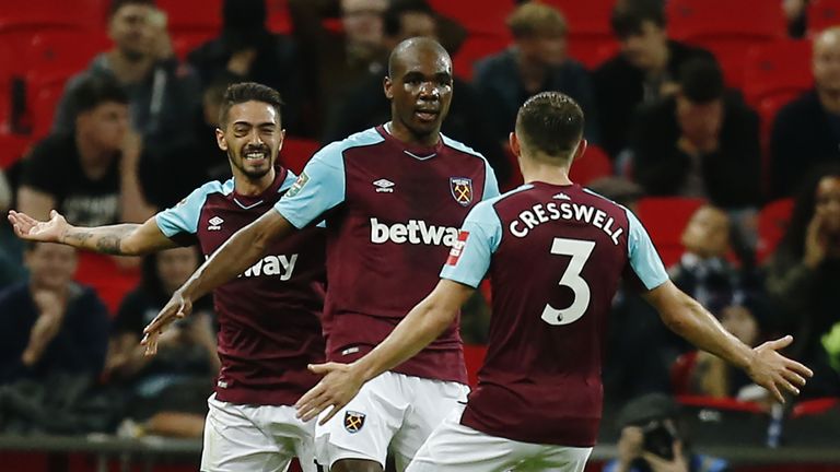 West Ham United's Italian defender Angelo Ogbonna (C) celebrates with teammates scoring the team's third goal during the English Premier League football ma