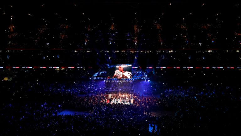A general view of the stadium as Britain's Anthony Joshua enters the ring ahead of his world heavyweight title fight against challenger Cameroon-born Carlo