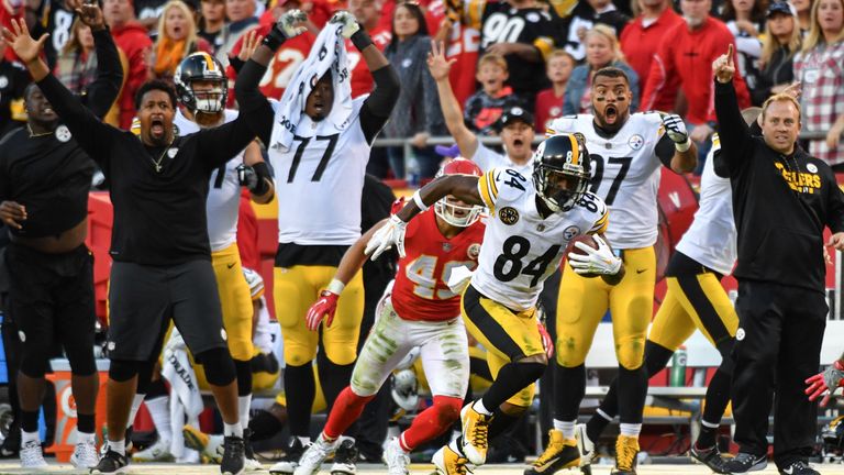 KANSAS CITY, MO - OCTOBER 15: Wide receiver Antonio Brown #84 of the Pittsburgh Steelers make a circus catch on a tipped ball in front of cornerback Daniel