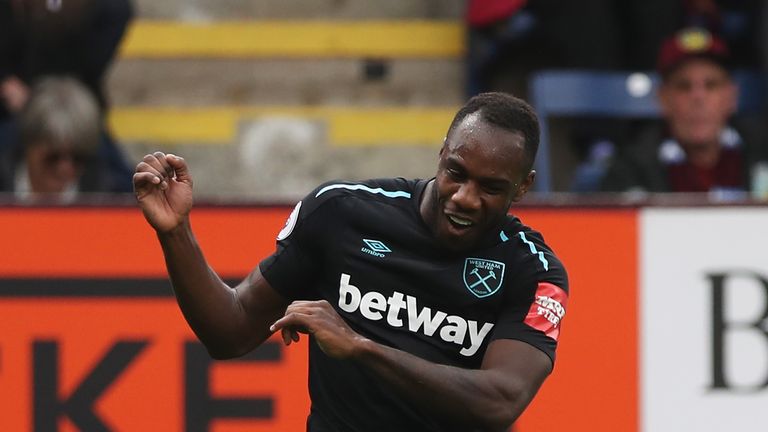 BURNLEY, ENGLAND - OCTOBER 14: Michail Antonio of West Ham United celebrates scoring his sides first goal during the Premier League match between Burnley a