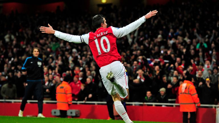 Arsenal's Dutch striker Robin Van Persie celebrates scoring his goal during the English Premier League football match between Arsenal and Everton at The Em