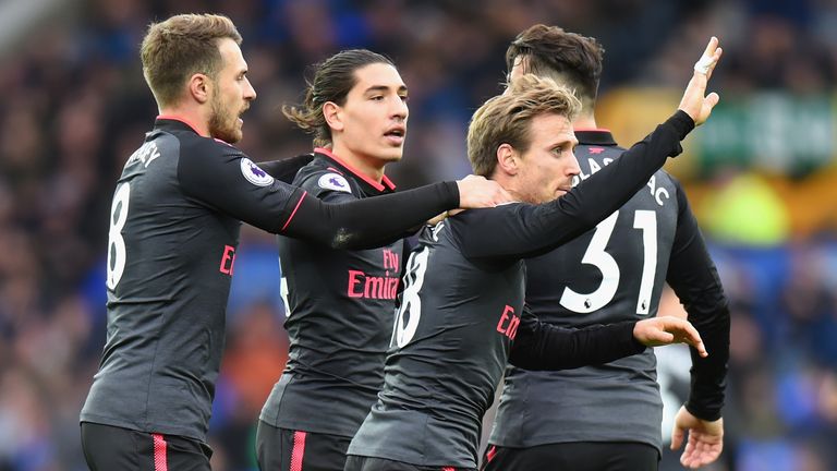 LIVERPOOL, ENGLAND - OCTOBER 22: Nacho Monreal of Arsenal celebrates scoring his sides first goal with his Arsenal team mates during the Premier League mat