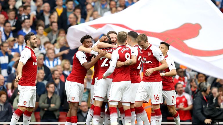 LONDON, ENGLAND - OCTOBER 01: Nacho Monreal of Arsenal celebrates scoring his sides first goal with his Arsenal team mates during the Premier League match 