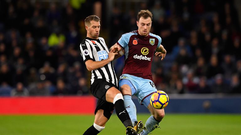 BURNLEY, ENGLAND - OCTOBER 30:  Ashley Barnes of Burnley and Florian Lejeune of Newcastle United during the Premier League match between Burnley and Newcas